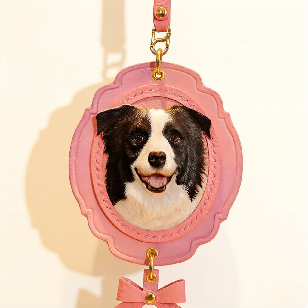 Custom Pet Leather Keychain featuring a Border Collie dog, pink color with bow decoration, personalized pet keepsake