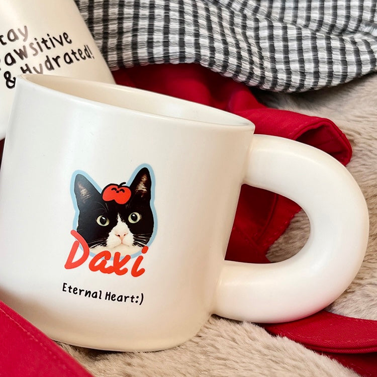 White ceramic cat mug with black and white cat face and personalized name Daxi, cute gift for cat lovers