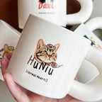 White ceramic cat mug featuring a tabby cat illustration and personalized name HuNiu, ideal for cat owners
