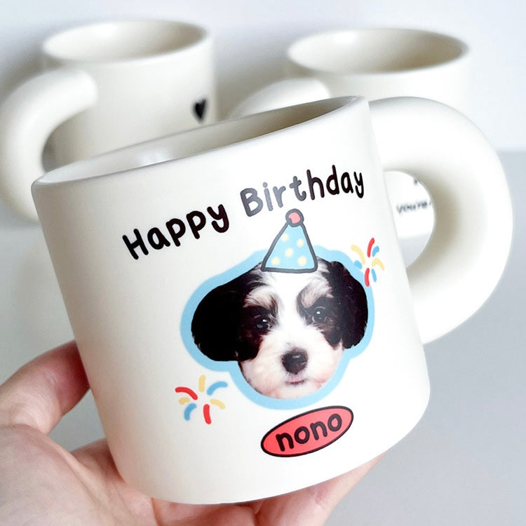 White ceramic dog birthday mug with a cute dog face and personalized name Nono, perfect gift for pet lovers