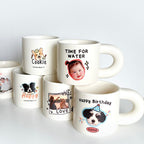 Collection of white ceramic personalized mugs featuring dog, cat, and baby photos, ideal gifts for pet and family lovers